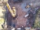 View from the old bridge looking down on the new caisson foundations being drilled. thumbnail image