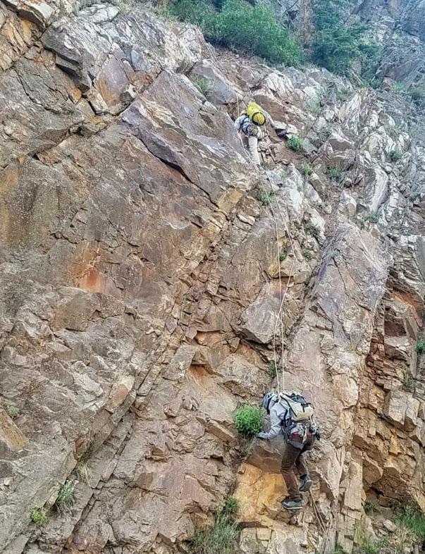 Rock-scaling crews clean loose materials.jpg detail image