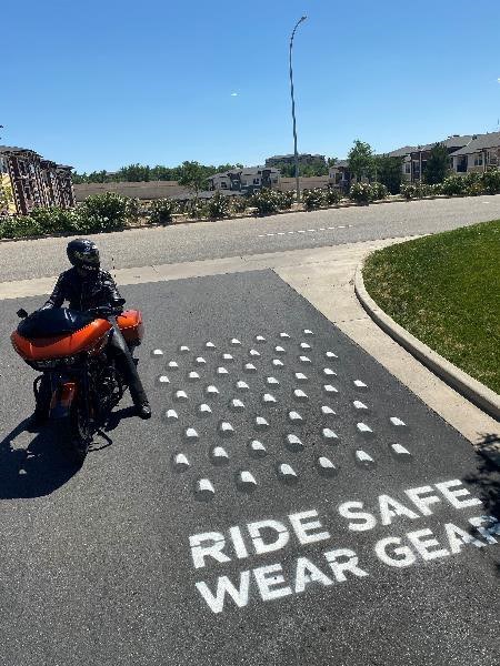 Human Cheese Grater image on roadway