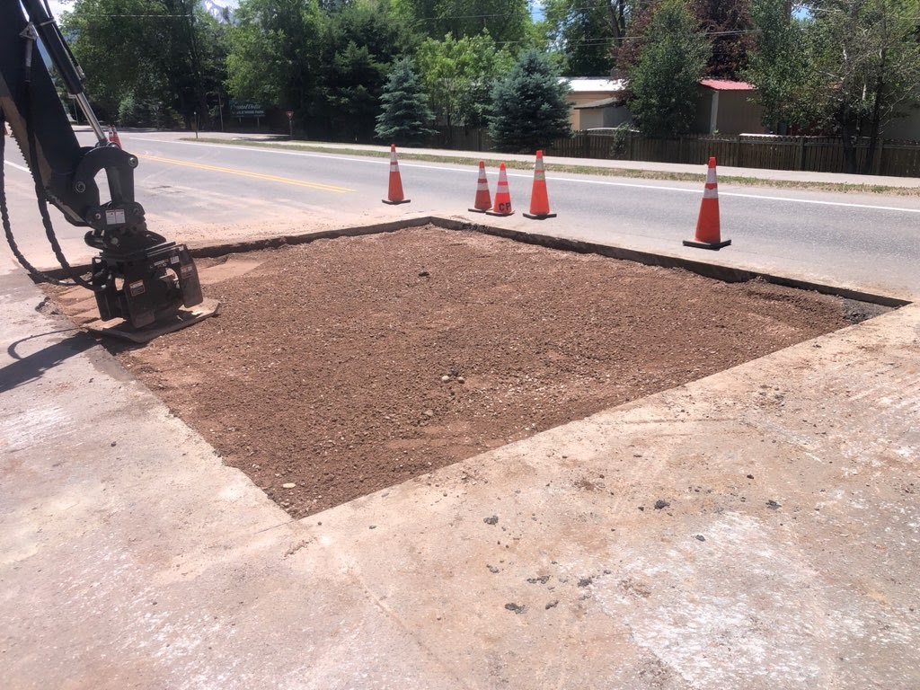 Repaired sink hole in Carbondale filled with dirt detail image