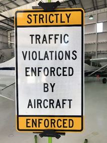 Traffic violations enforced by aircraft strictly enforced sign detail image