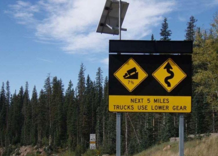 Next 5 Miles Trucks Use Lower Grade sign in Wolf Creek Pass detail image