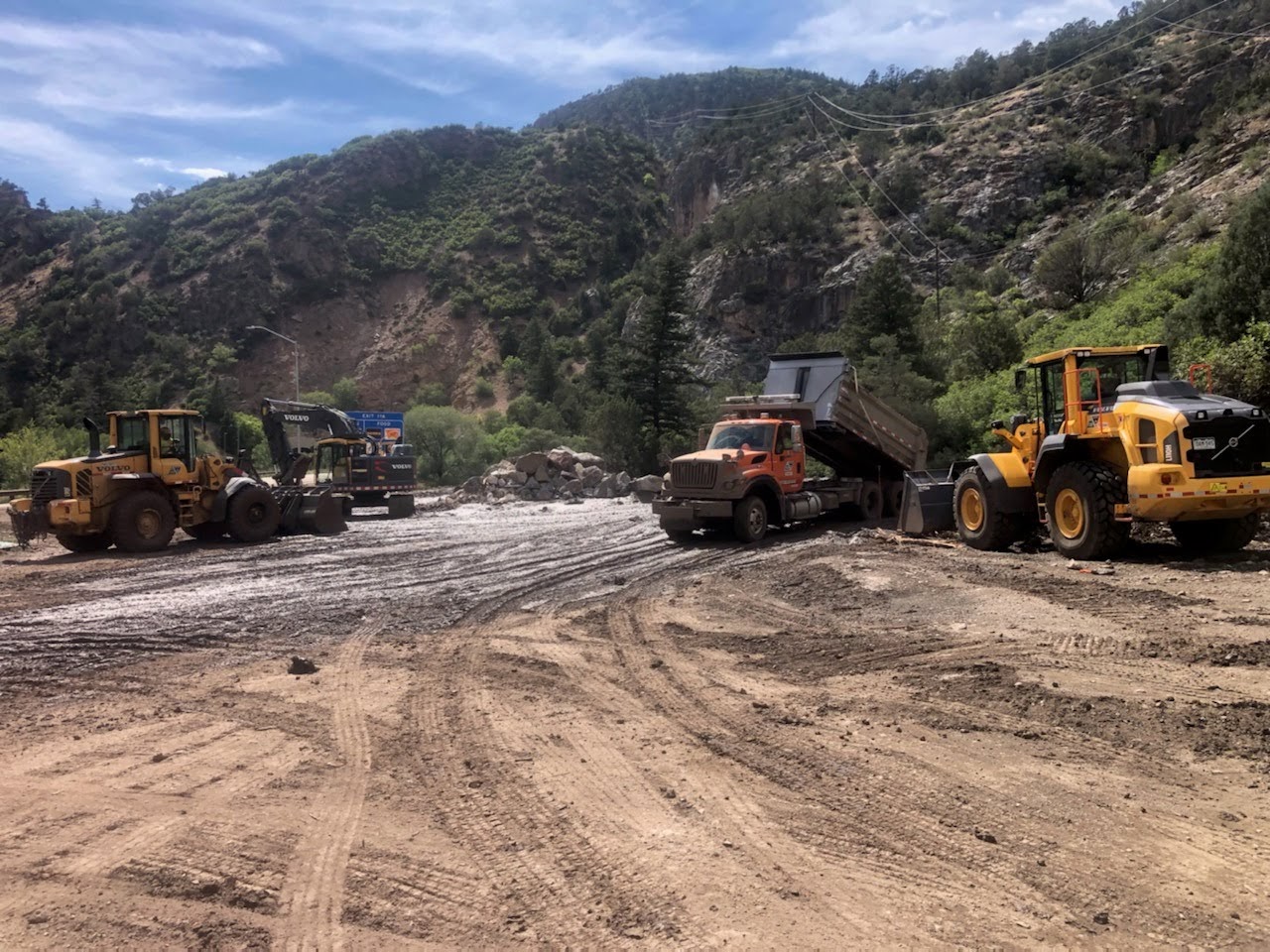 Glenwood Canyon mudslide crews assemble tractors for clean up detail image
