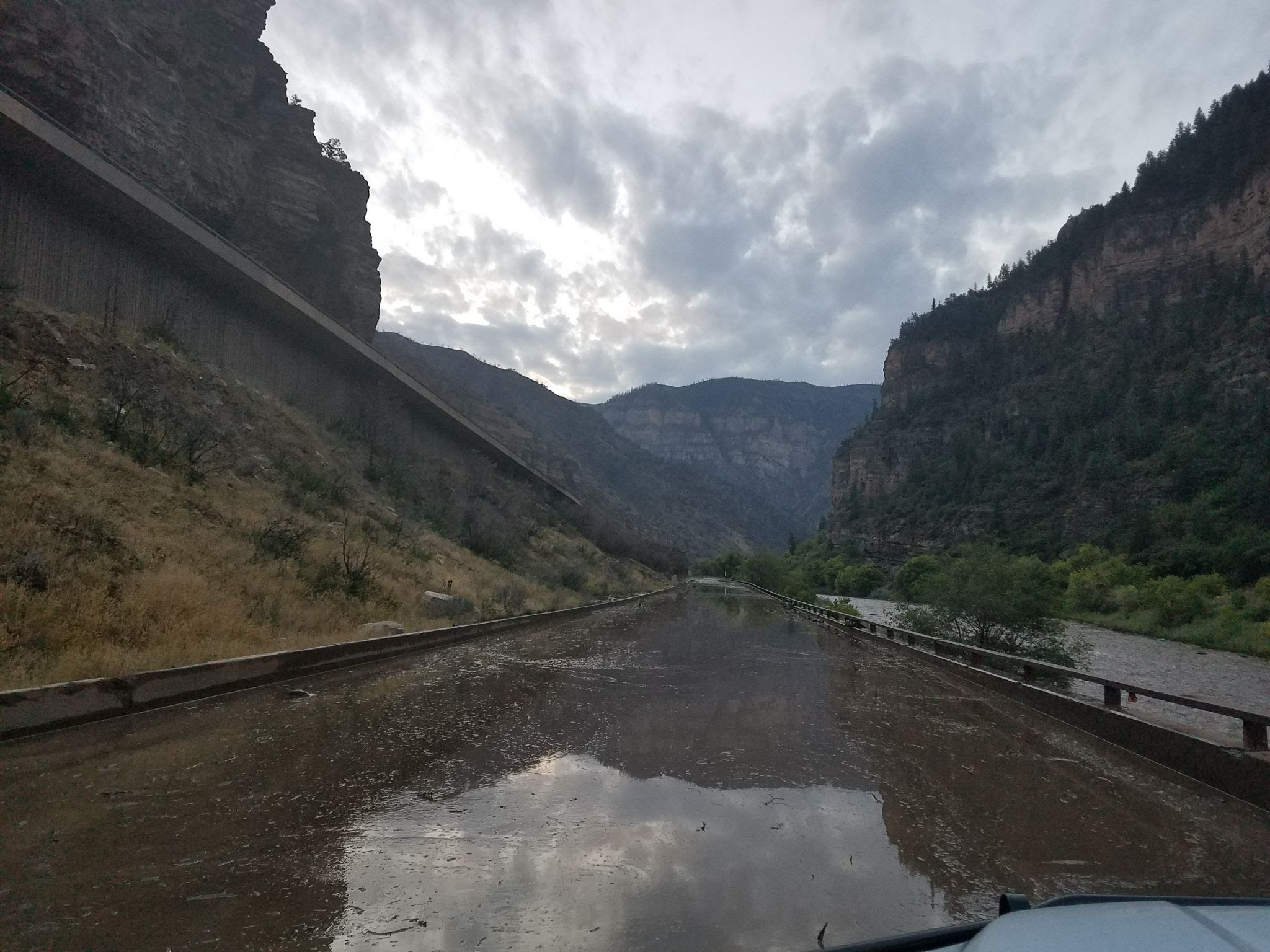 Glenwood Canyon mudslide water on the road detail image