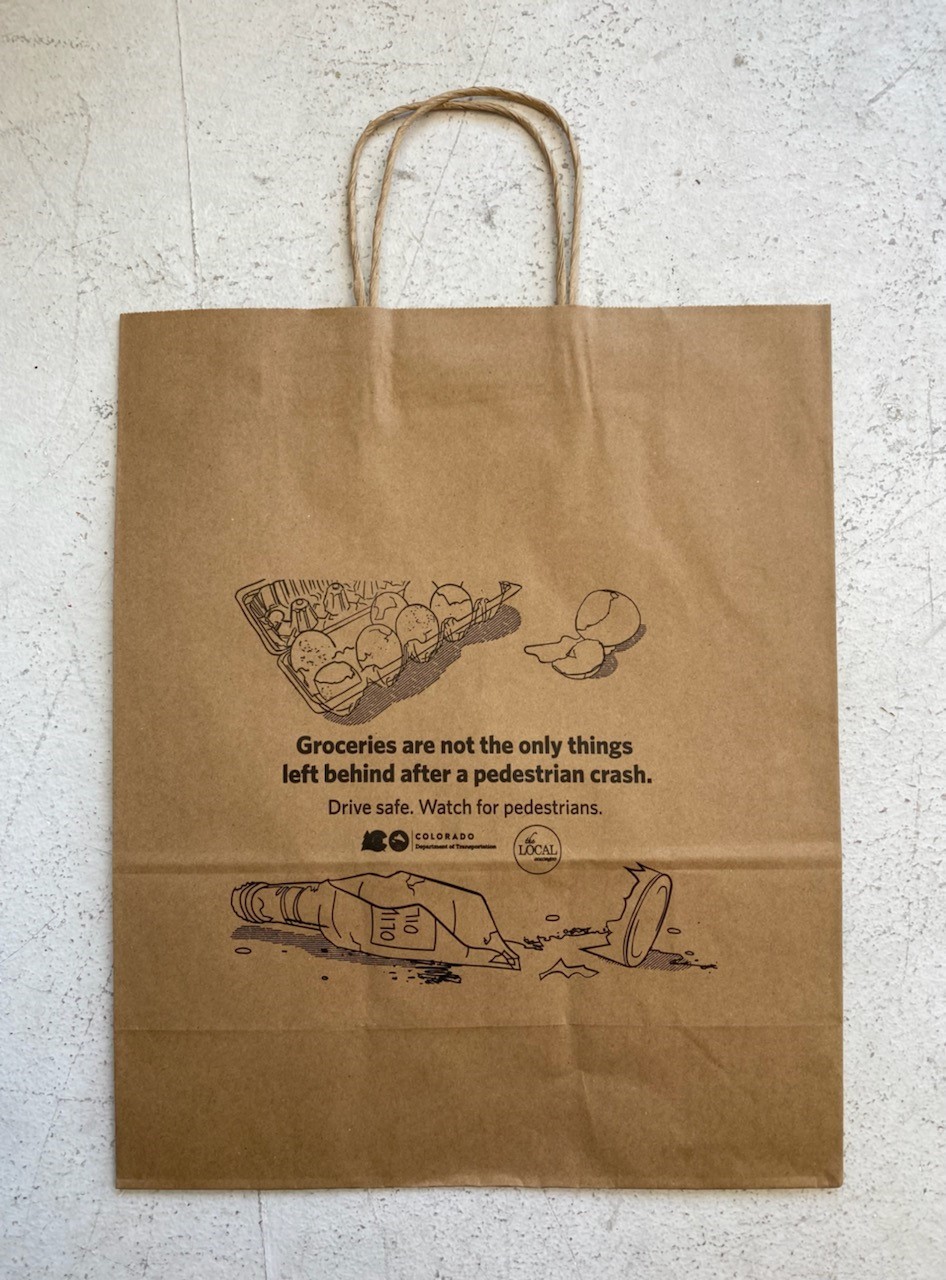Groceries aren't the only thing left behind after a crash - shopping bag detail image