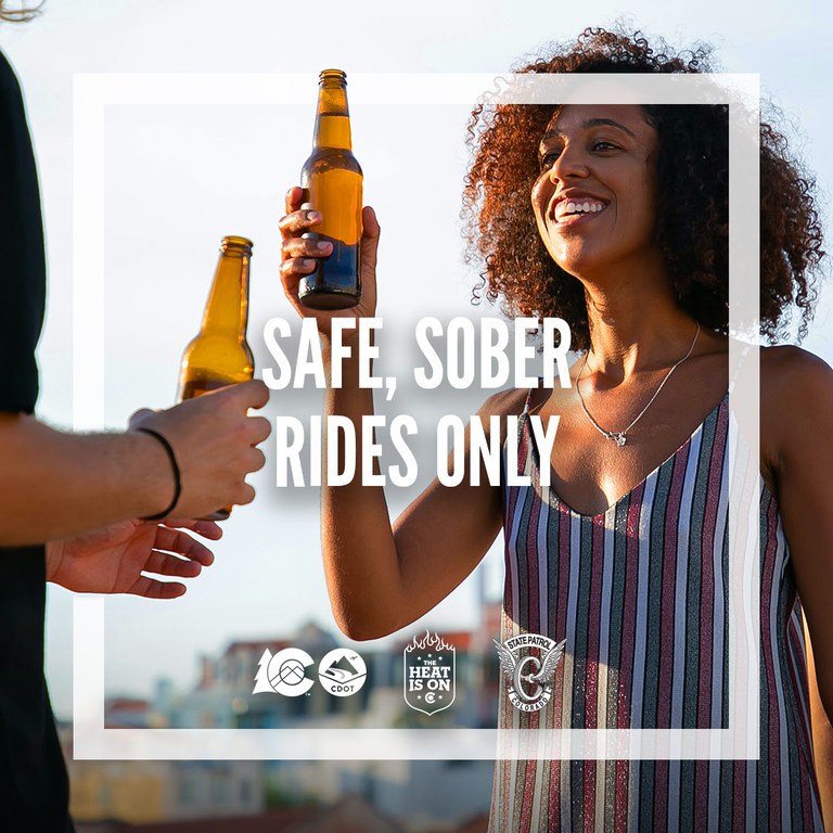 Photo showing two people drinking a beverage with the words "safe, sober rides only" over the top of them. 