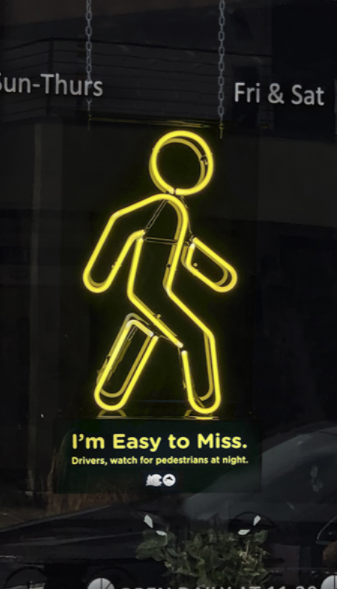 Pedestrian safety neon sign detail image