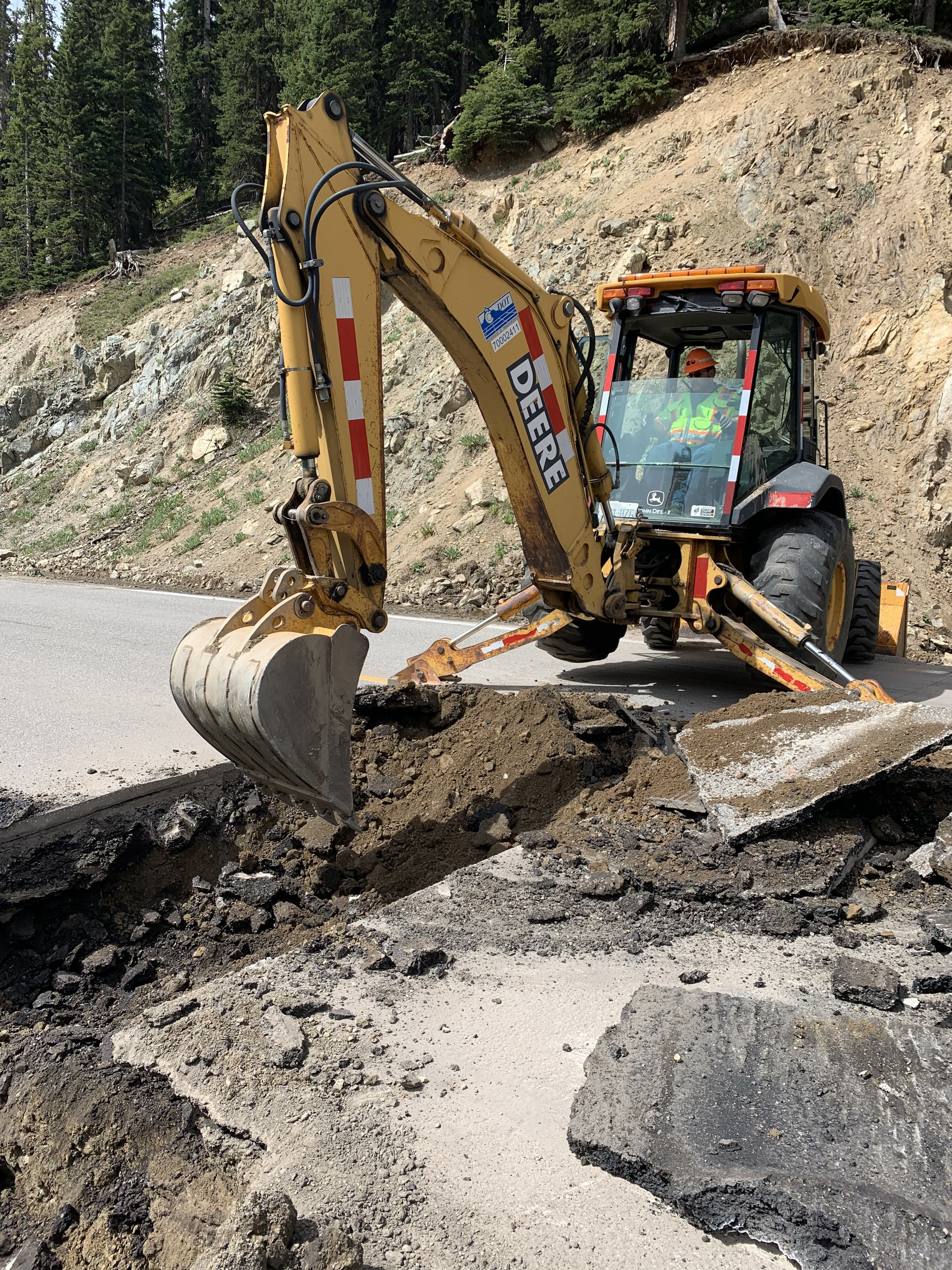 Crew member in tractor on US 6 Loveland Pass detail image