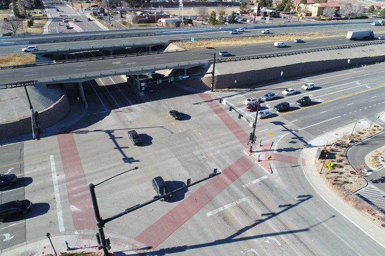 Aerial and ground-level views of the bridges at I-70 over 32nd Avenue in Wheat Ridge. The open space seen between the westbound and eastbound bridges will be filled in to create wider shoulders for safety. 