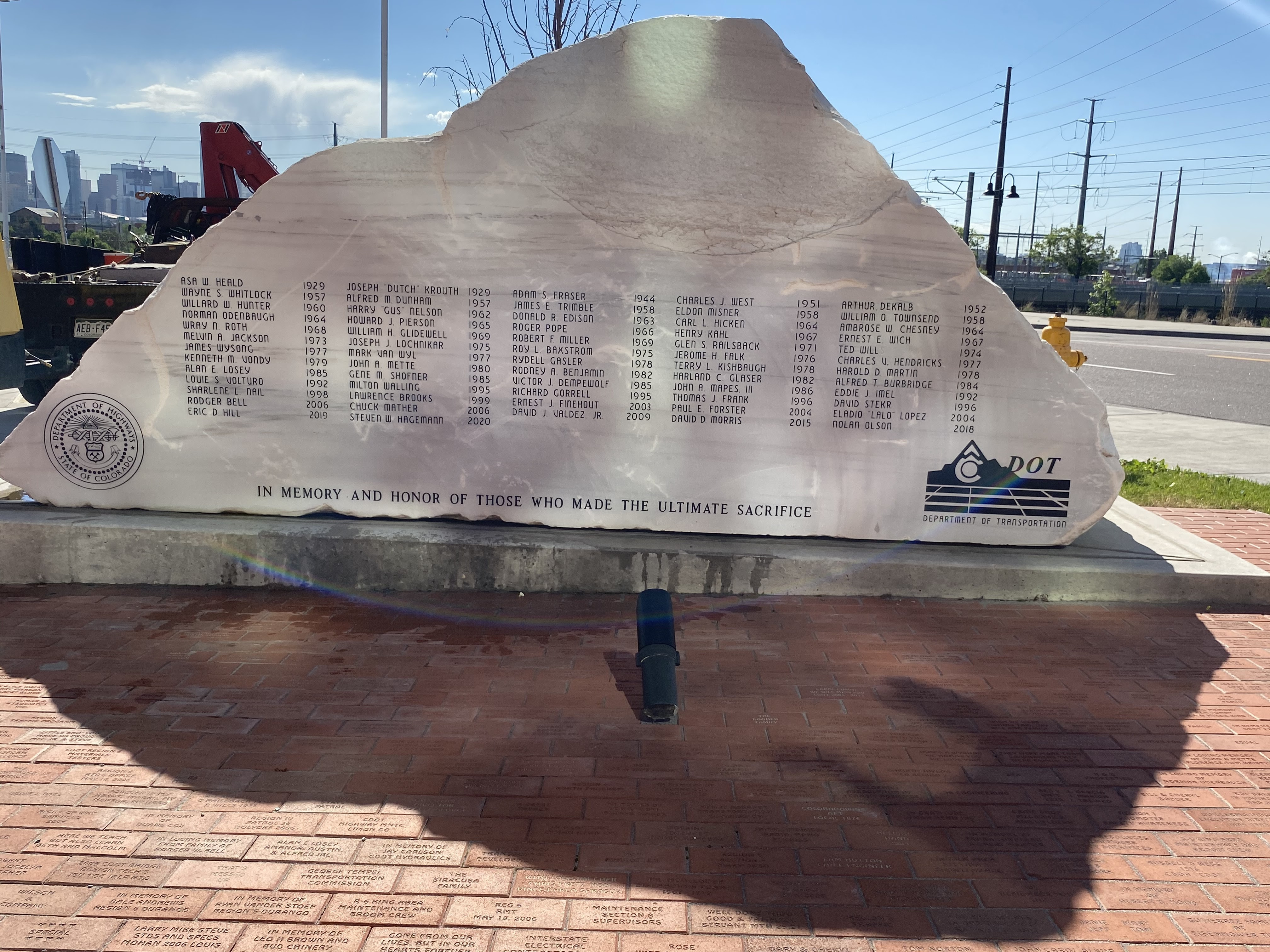 CDOT pays tribute to the 62 employees lost in the line of duty by having the names of their fallen colleagues etched onto the marble memorial outside its Denver headquarters.jpg detail image
