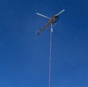 Helicopter hovers above US 160 Wolf Creek Pass with a suspension line.jpg thumbnail image