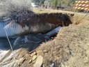 Soil erosion caused by heavy spring run-off in the Stollsteimer Creek which runs along and under CO 151.jpg thumbnail image