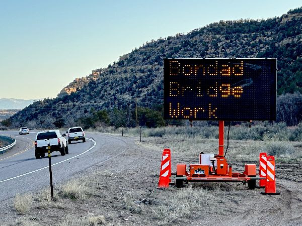 VMS sign on US 550 reminds commuters to expect delays next week while CDOT crews repair potholes on the bridge south of Bondad Hill.jpg detail image