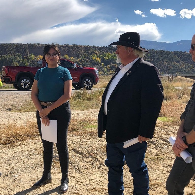 State Representative Elizabeth Velasco, left, and State Senator Perry Will gave spoken remarks during the gathering on Oct. 10, 2023.