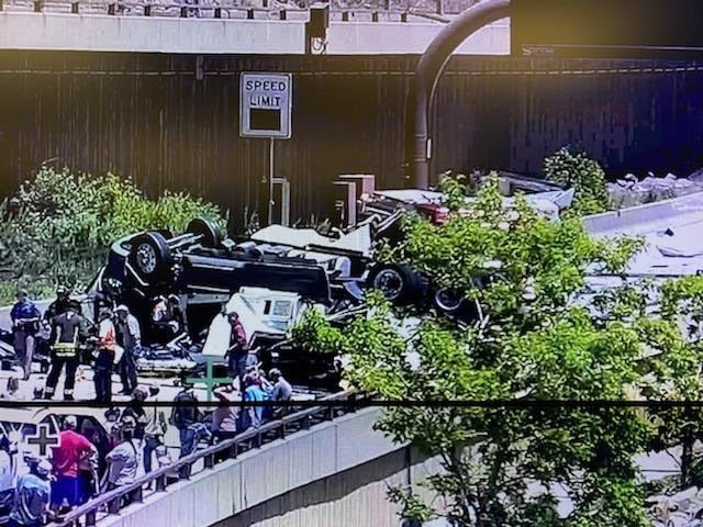 Crashed commercial motor vehicle on I-70 in Glenwood Canyon traveling eastbound at Mile Point 118 on May 28, 2022. Guardrail was damaged by the crash.