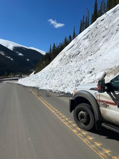 A vehicle next to one of two bank slides that took place along US 40 Berthoud Pass the morning of Tuesday, March 20, 2024. 