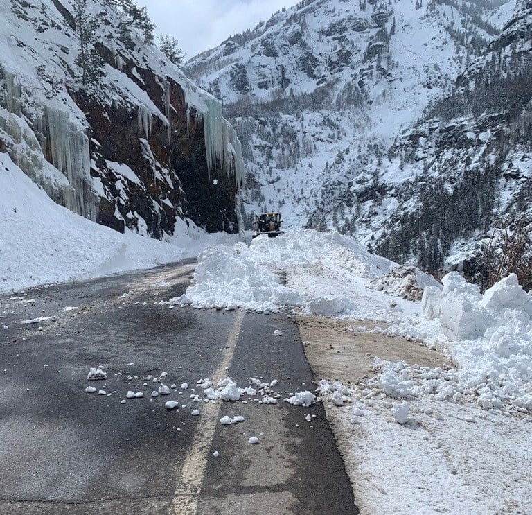 Snow slide debris from US Highway 550 south of Ouray during previous winter maintenance operations that occurred on March 15, 2024. 