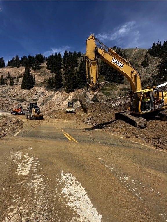 Heavy-duty trucks clearing debris from the Loveland Pass (US 6) landslide captured on Tuesday, June 17. Phase 1 cleanup on the roadway has since been completed. Heavy-duty trucks clearing debris from the Loveland Pass (US 6) landslide captured on Tuesday, June 17. Phase 1 cleanup on the roadway has since been completed.