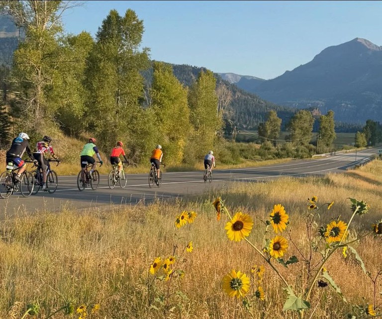 Cyclists ride single file along US 160 Wolf Creek Pass during last year's Colorado's Ride event in southwest Colorado.