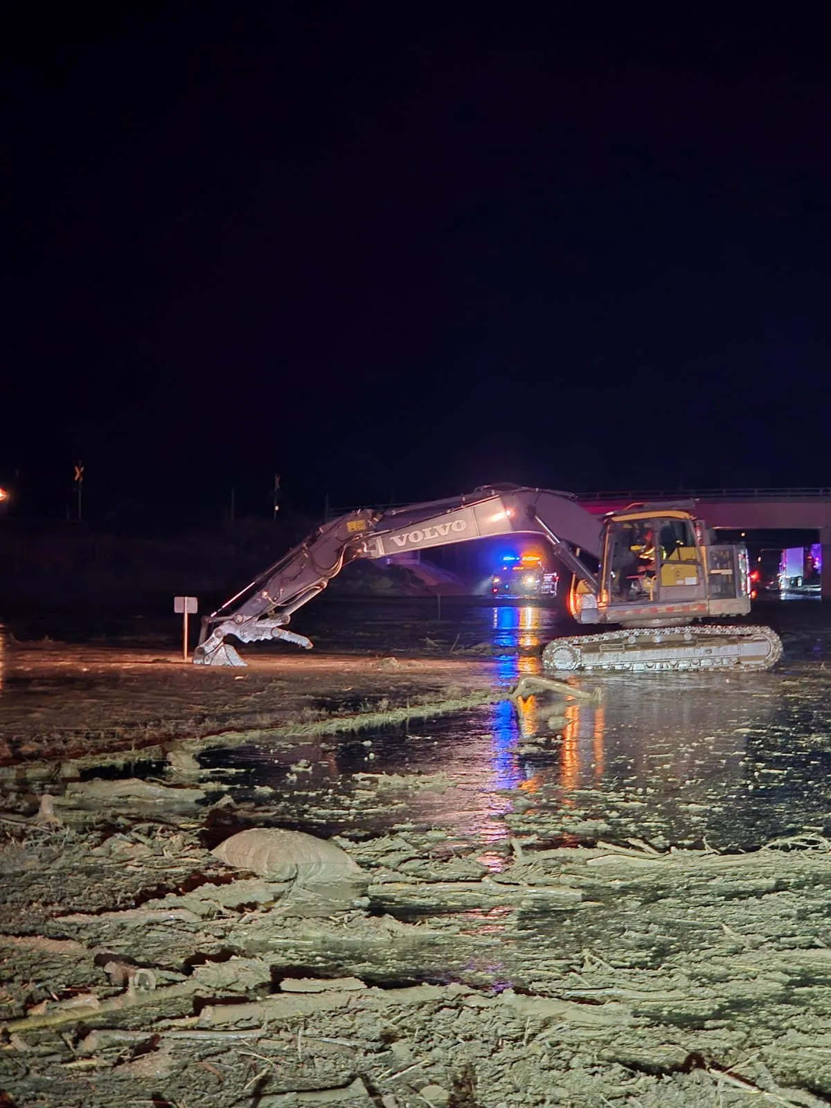 Crews working around the clock removing mud and debris on I-70 between New Castle and Silt.jpg detail image