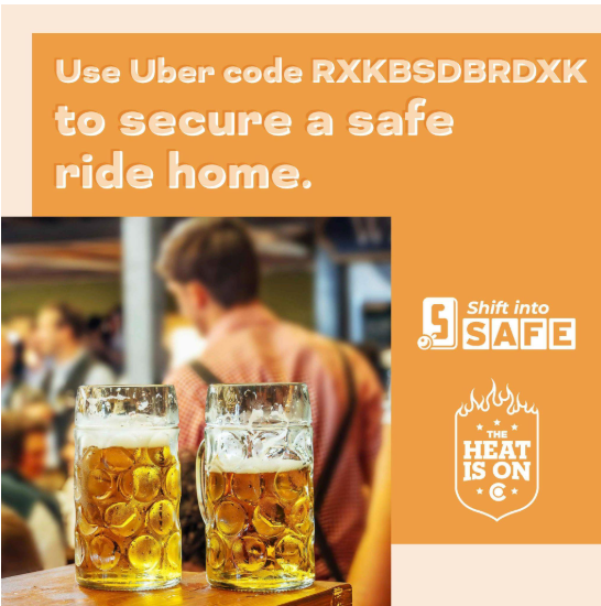 Two glasses of alcohol on a table. Copy reads, “Use Uber code RXKBSDBRDXK to secure a safe ride home.”