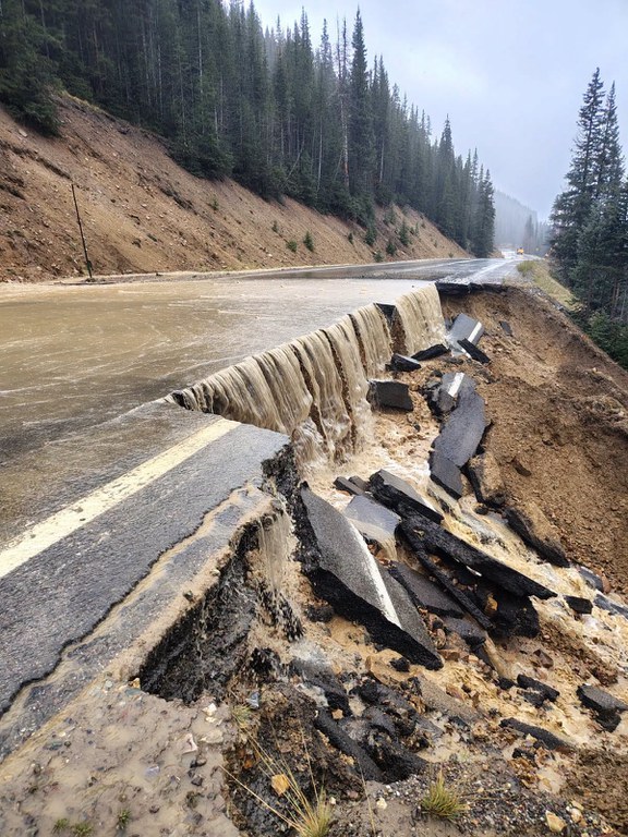 Shoulder and travel lane damage due to flooding on US 550