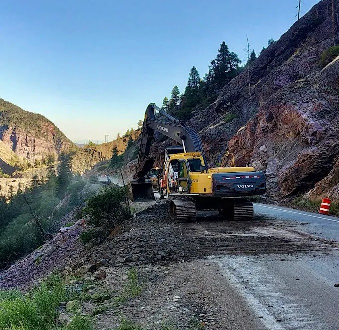 CDOT personnel operate heavy equipment to reinforce the shoulder of US 550 near Ruby Walls, south of Ouray.