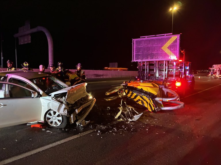Vehicle crashed into attenuator. Attenuator is attached to a CDOT Incident Response Truck with a digital arrow board.