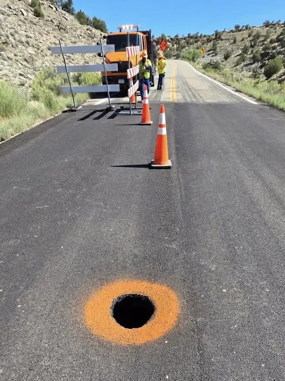 The sinkhole at CO 141 MP 24 was approximately one-foot in diameter on the pavement surface.