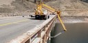 A snooper truck is used to help inspectors get a better look at the underside of the bridge structure. thumbnail image