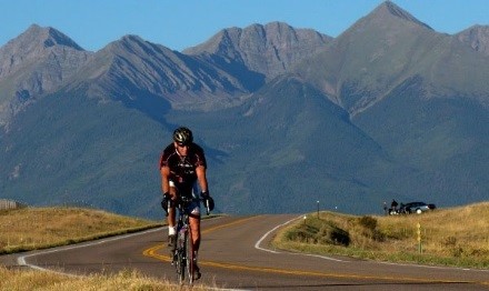 Bicyclist_Riding_On_Frontier_Pathways_Scenic_Byway_Westcliffe.jpg detail image