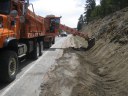 Grade-Alls can be used to help clean ditches of debris, thereby helping prevent roadways from flooding.  thumbnail image
