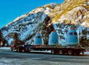 A semi truck delivers remote-controlled Gazex avalanche control units to be installed at the top of avalanche paths on Red Mountain Pass.jpg thumbnail image