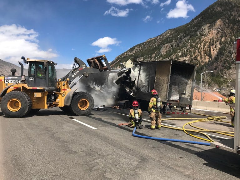 CDOT crews, firefighters hosing down semi-truck accident on I-70