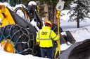 CDOT mechanic Ryan Smith using a tackle truck to repair a plow on Grand Mesa.jpg thumbnail image