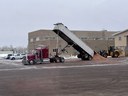 Semi dumping load of sand into parking lot.jpeg thumbnail image