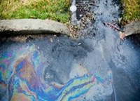 Oil sheen on water Oil, gas, or unknown substances with an oil sheen entering a storm drain inlet