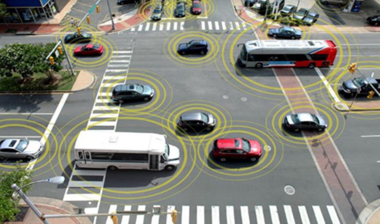 Vehicles crossing intersection with circles around them 