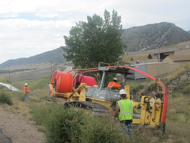 Crew Installing Conduit