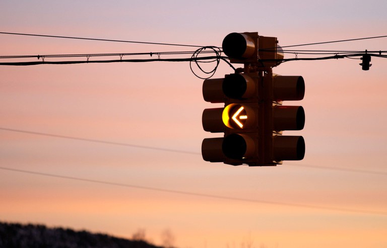 Signal with a yellow left turn signal displayed 