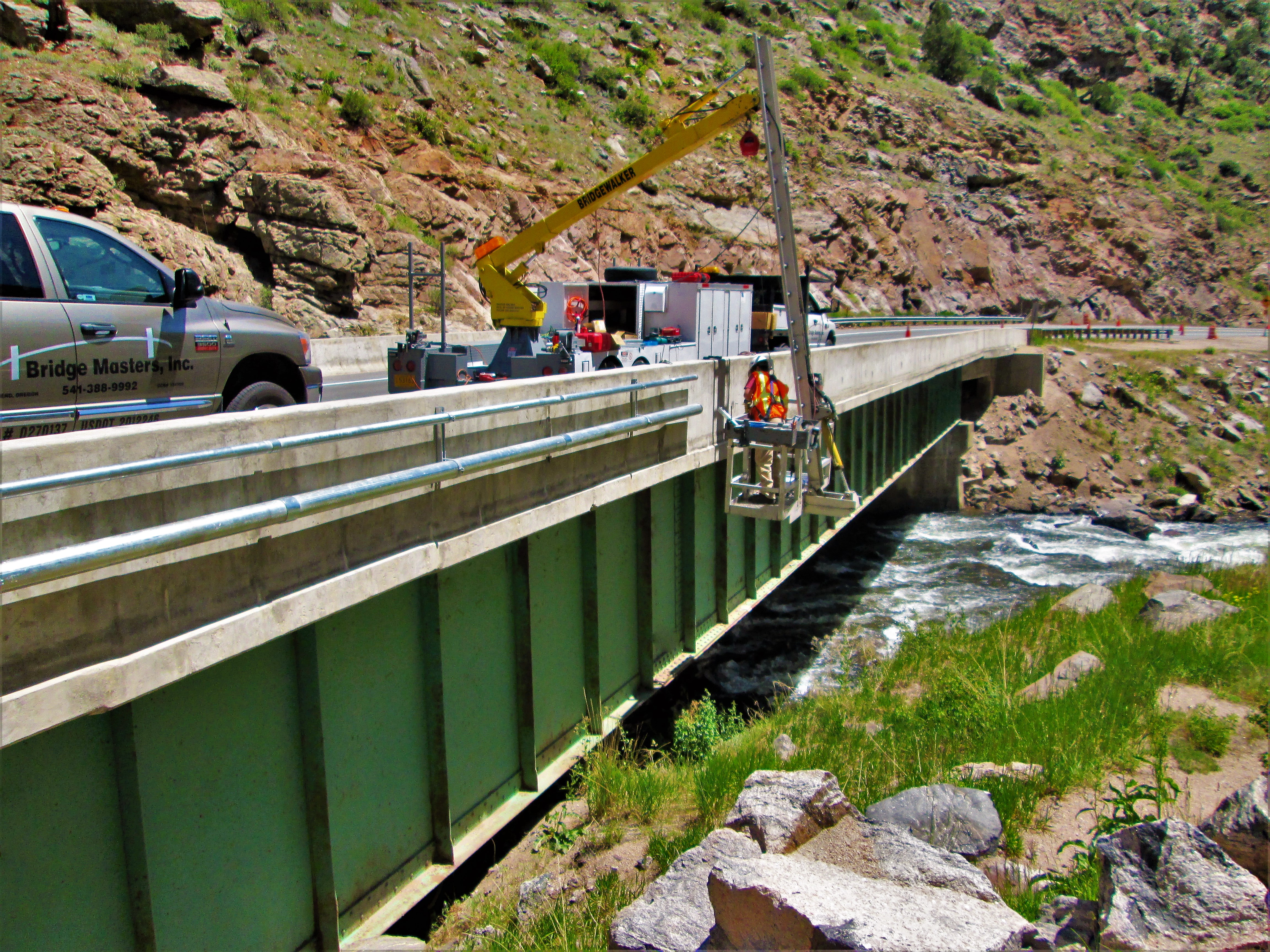 Installing bridge mounted conduit.JPG detail image