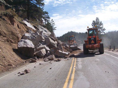 Rockfall Clean Up CDOT crews work to clear US24 after a rock slide near Florissant