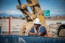 Worker in front of equipment thumbnail image