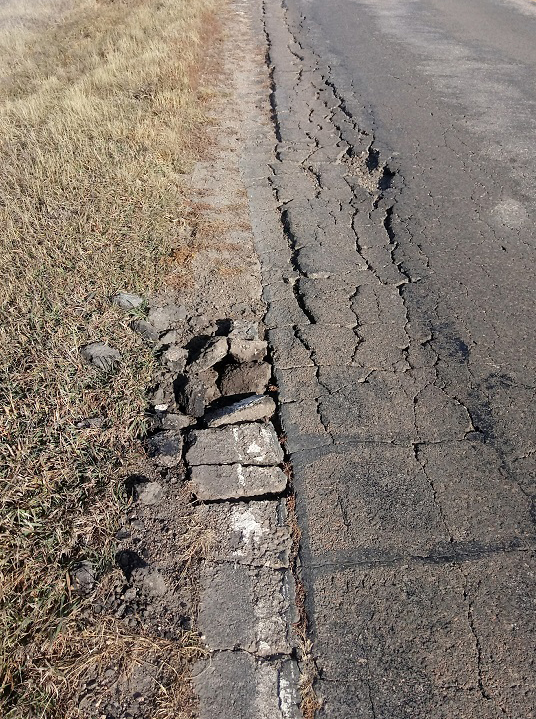 Damage to pavement on highway.