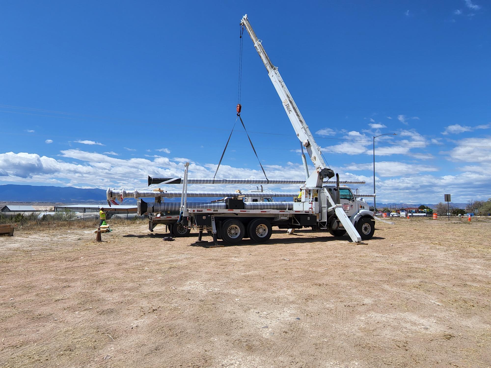 truck delivering new signal pole.jpg detail image