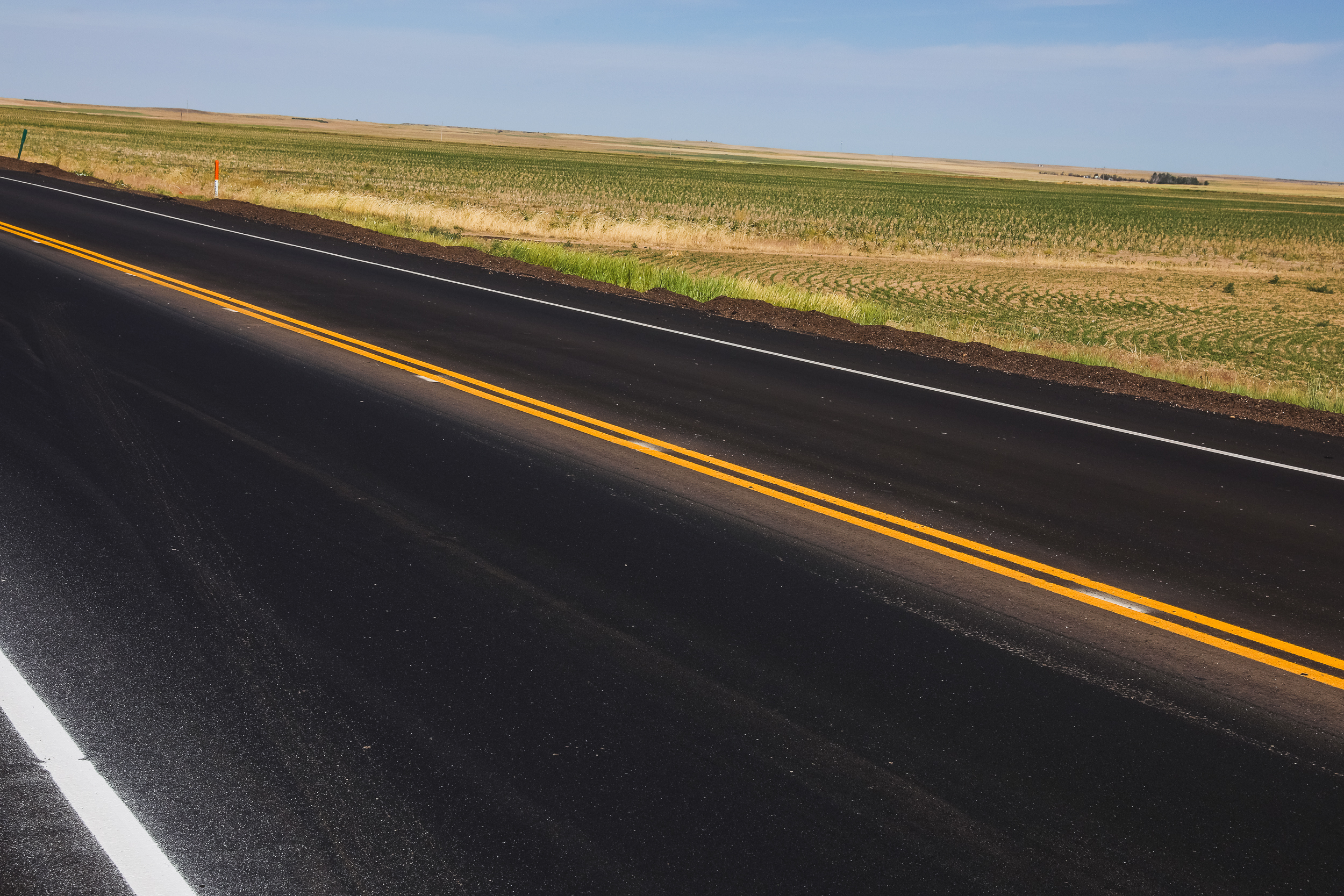 Closeup of newly paved section of CO 14 at CR 29 with temp striping.jpg detail image