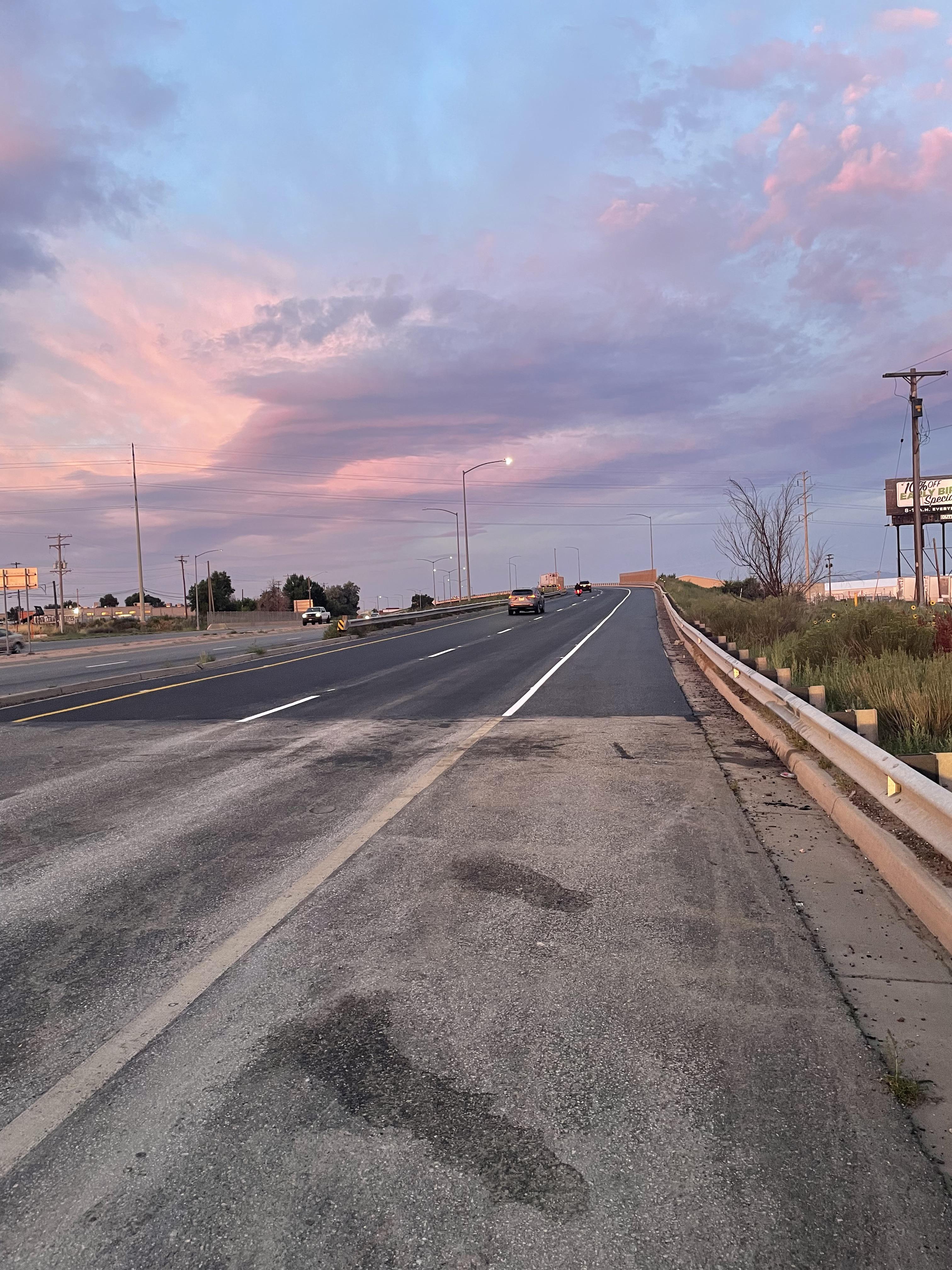Sunrise over a newly resurfaced section of Colorado Boulevard in August 2023 detail image