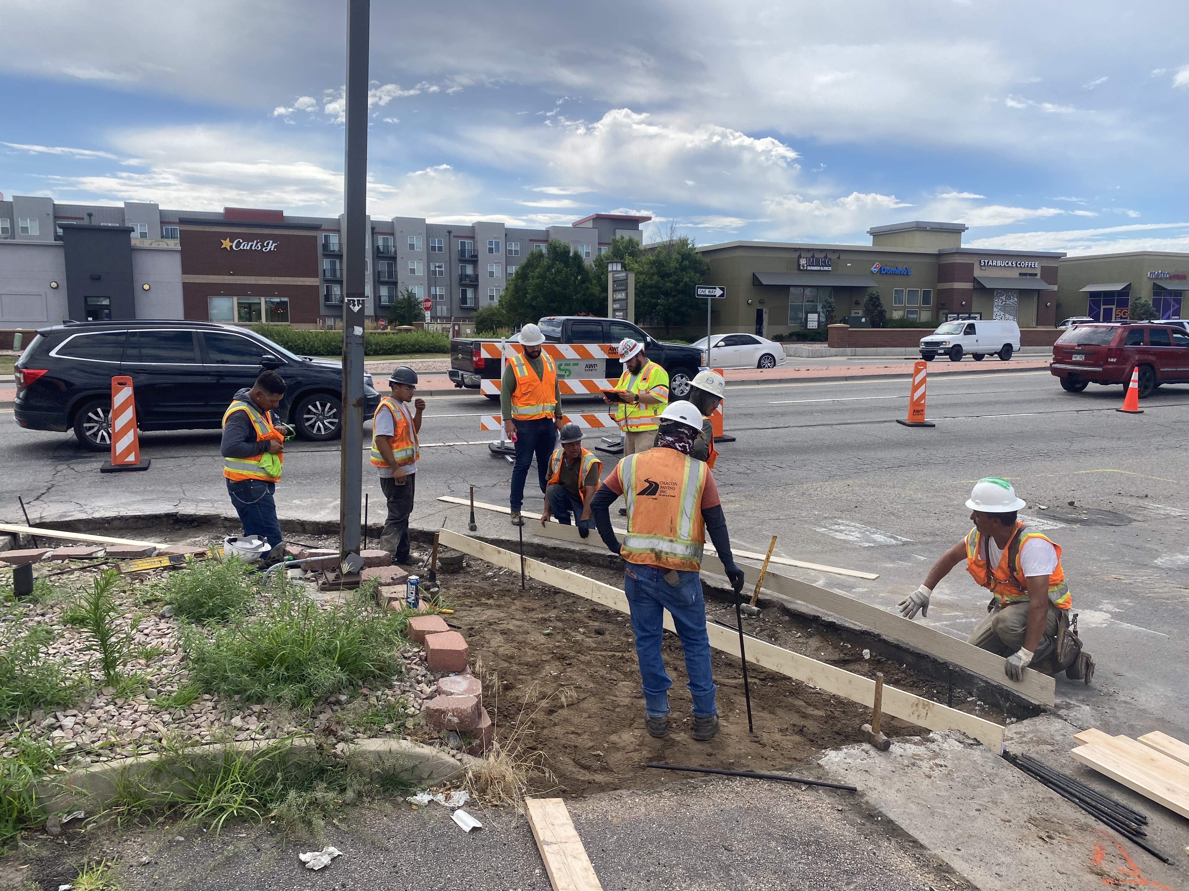 The project team creating ADA compliant curb ramps at 41st Avenue and Colorado Boulevard. detail image