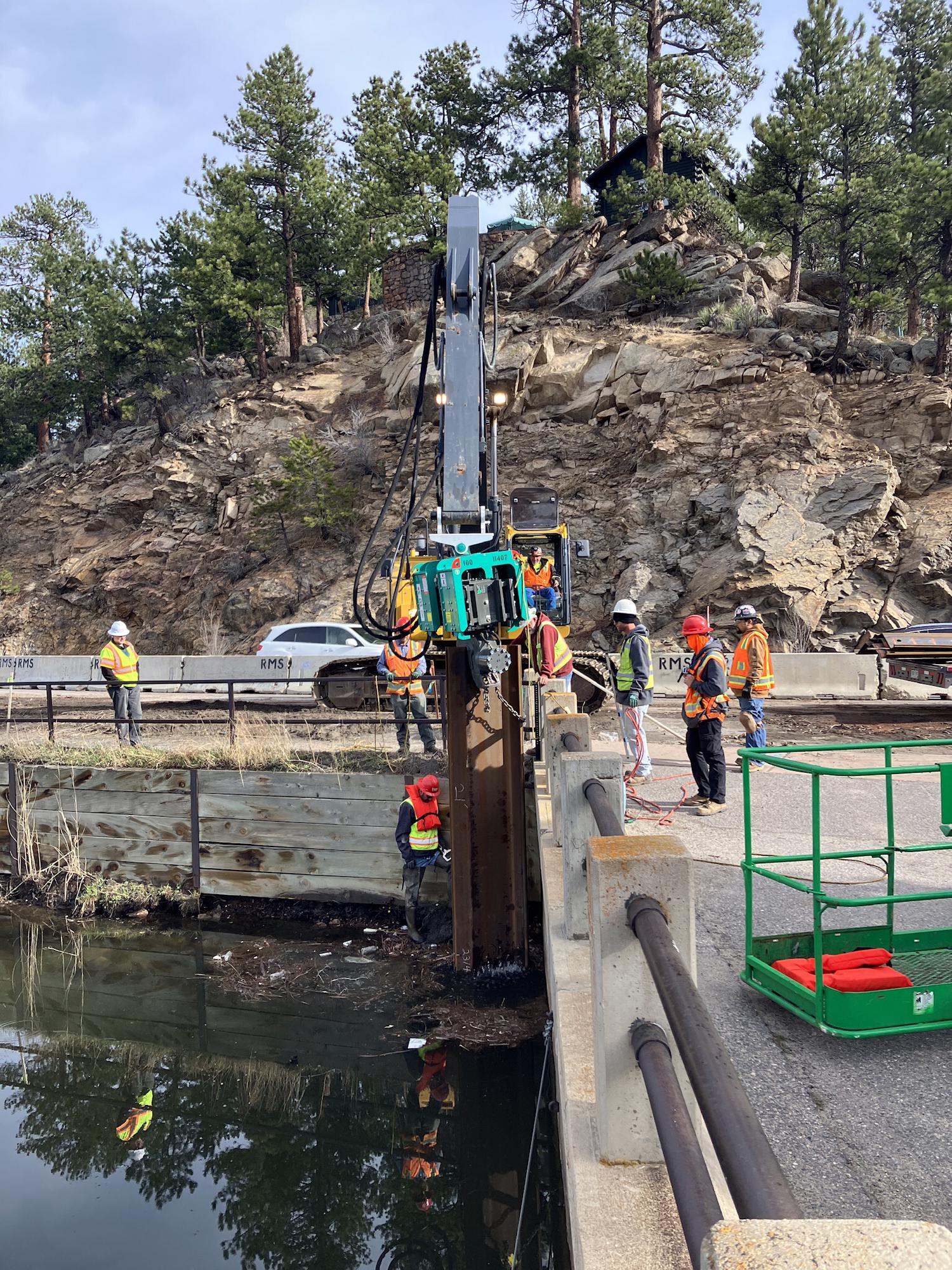 Sheet pile driving to stabilize the foundation of the improved roadway. Joseph Zink detail image
