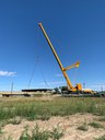 crews lower new deck onto bridge superstructure.jpg thumbnail image